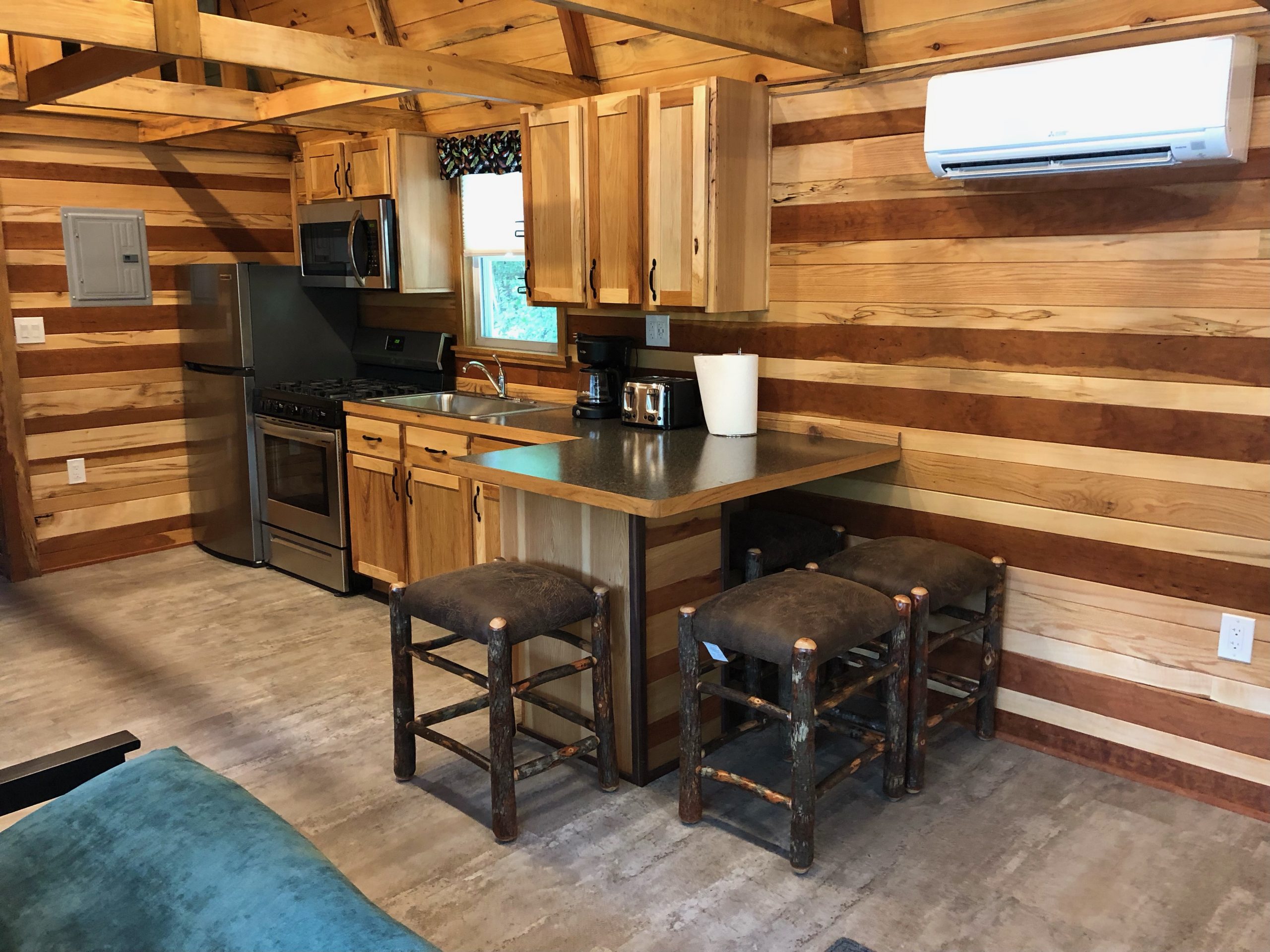 pond cabin kitchen with eat in bar