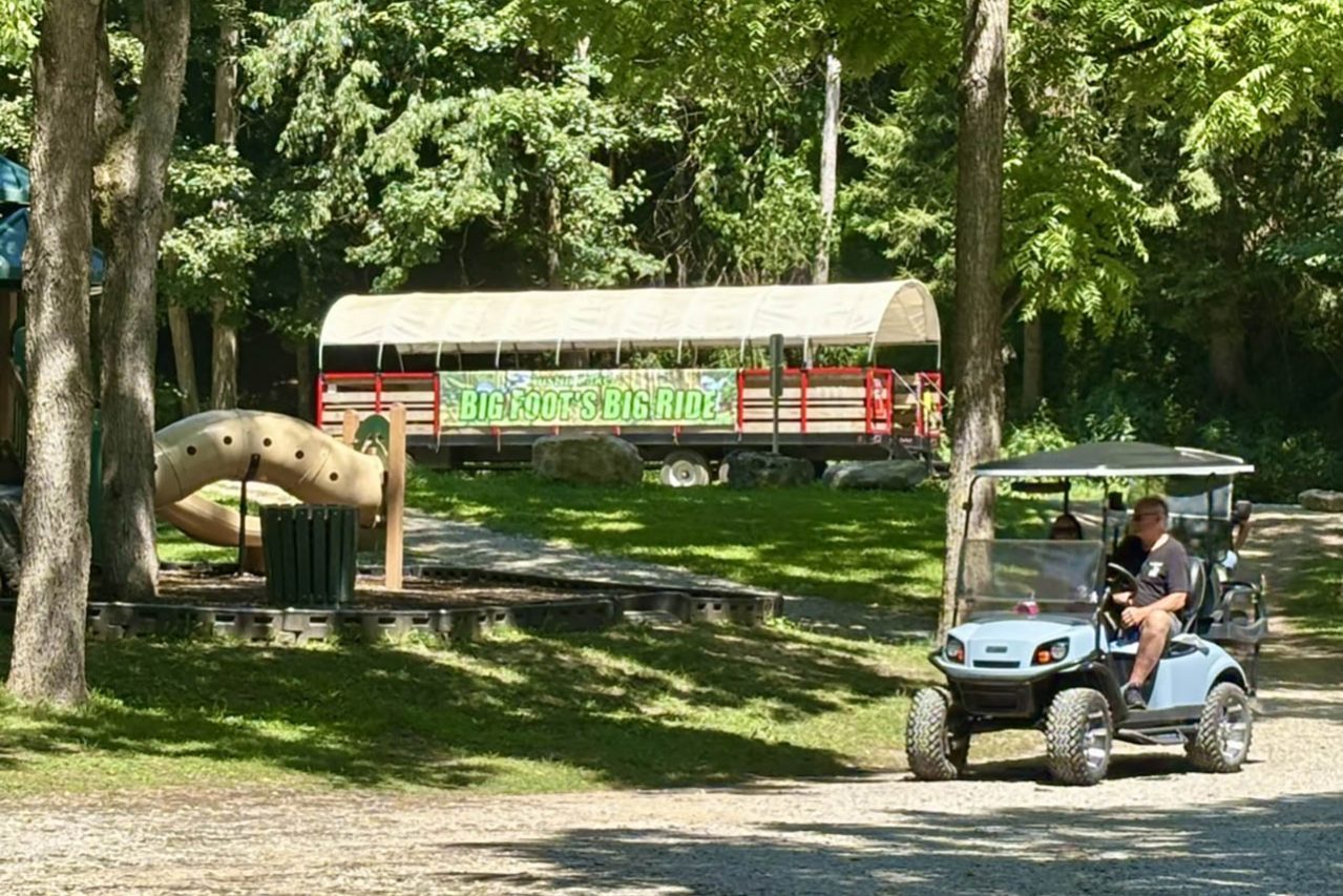 Austin Lake RV Park & Cabins rents golf carts and a fun family activity is a ride in Bigfoots Big Ride!